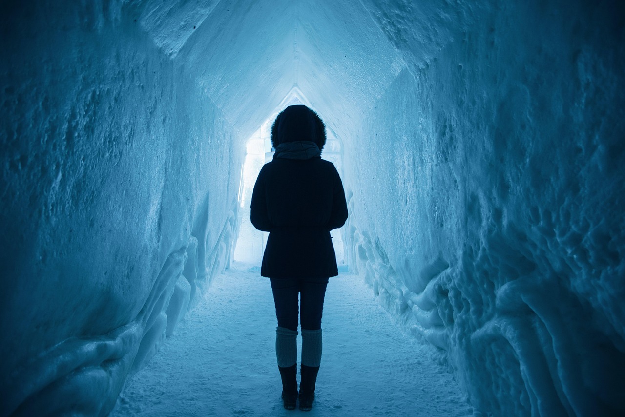 woman, adventure, ice cave, cold, exploration, frozen, ice, winter clothes, winter clothing, light, tunnel, winter, fros