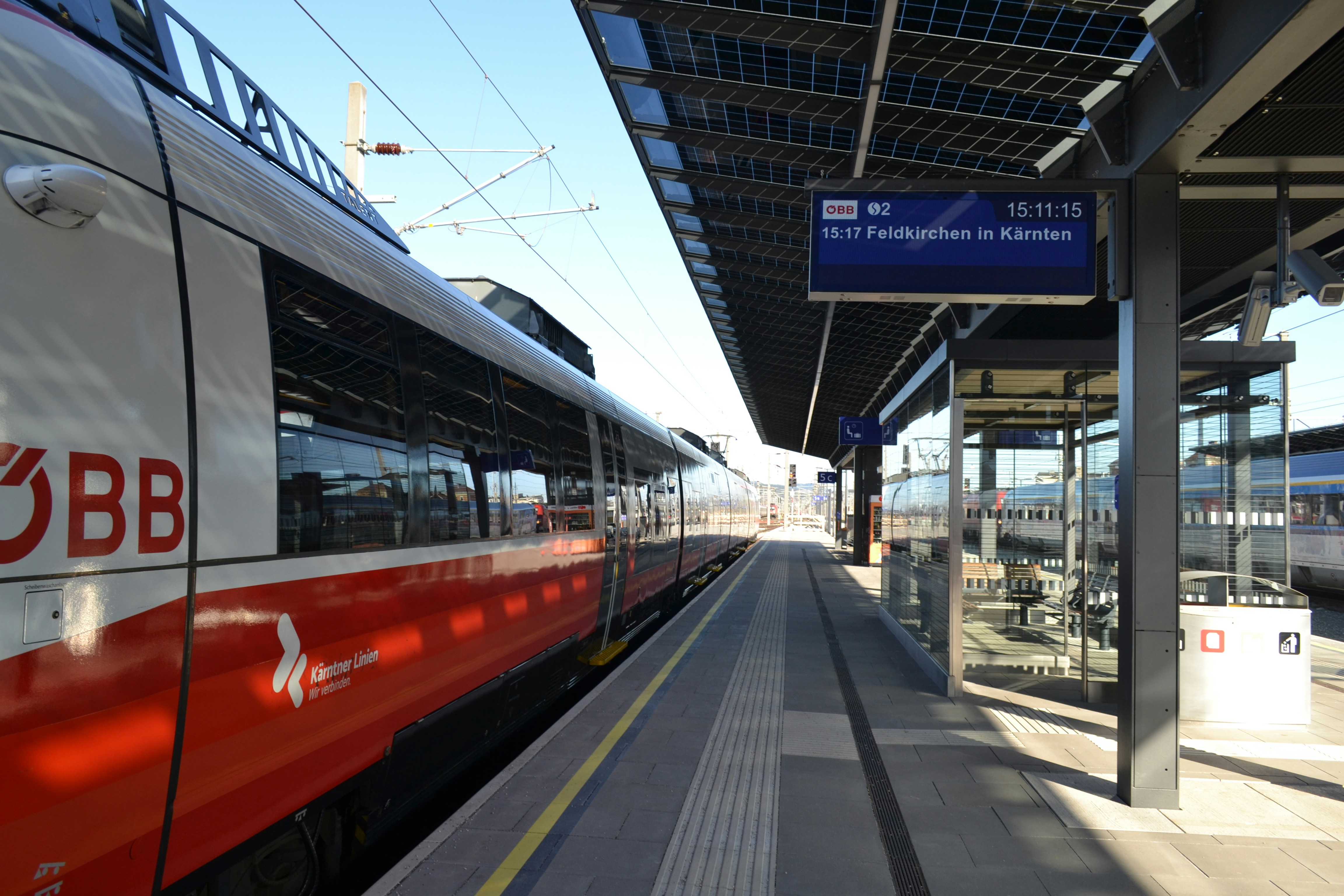A modern train at a station platform